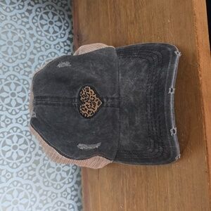 Grey trucker style baseball hat with leopard heart